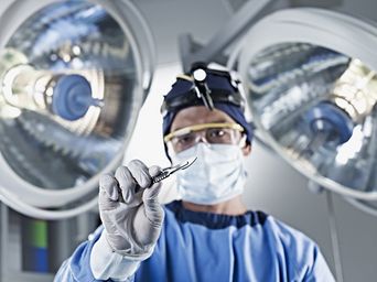 Surgeon with knife